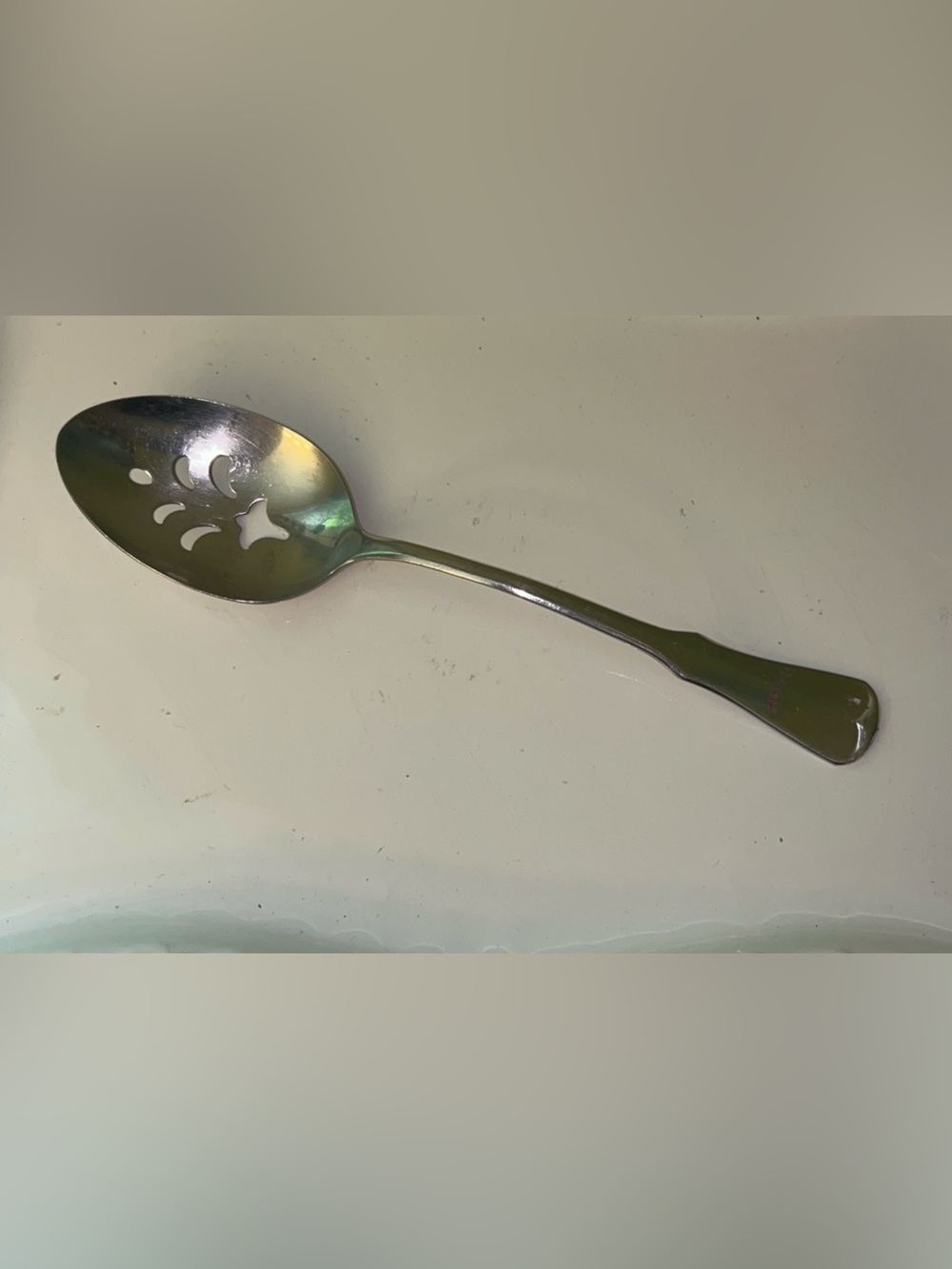 Patrick Henry pattern by Oneida Silver Slotted Serving Spoon